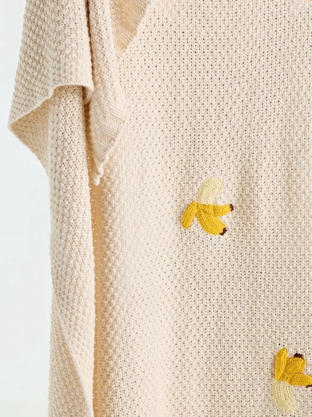 Isabella Cotton Knit Icon Banana Throw Blanket from Anthropologie